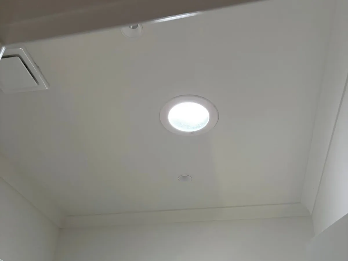 The same ceiling after, with a new round ceiling fitting
