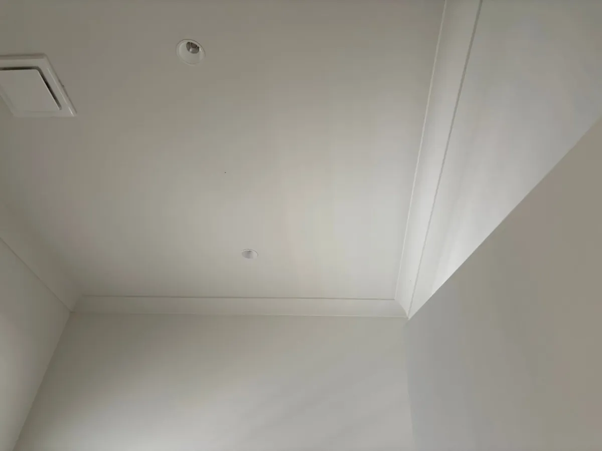 Plain white ceiling before the install