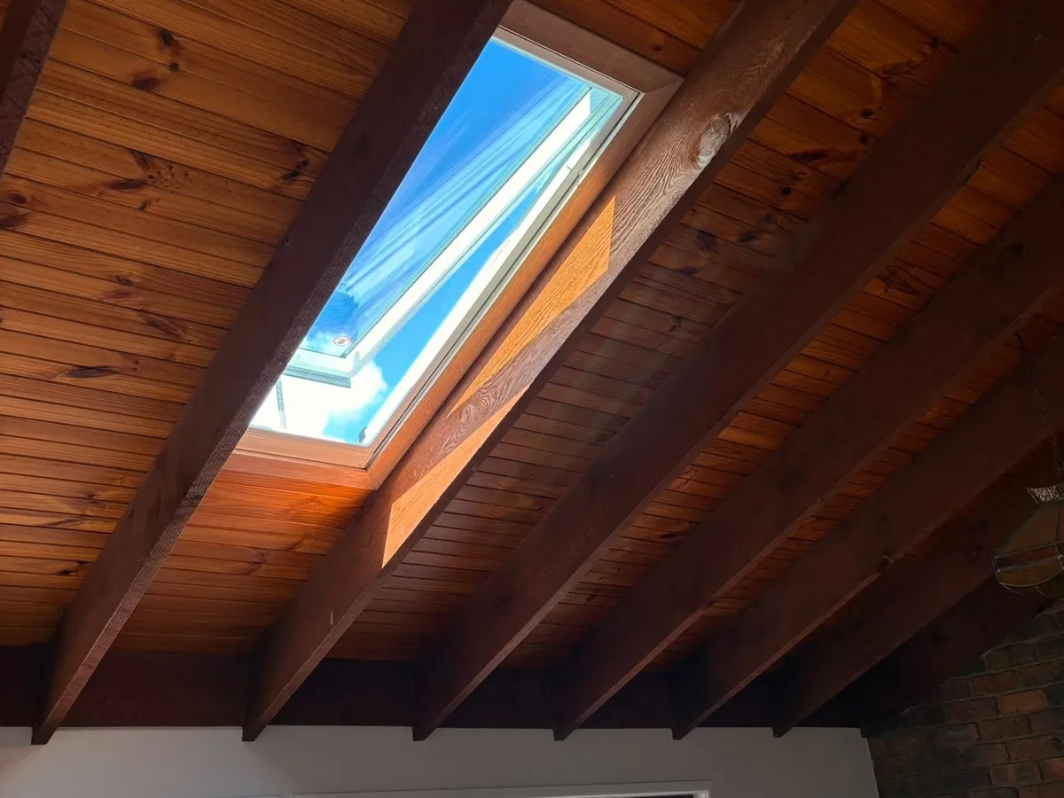 The same ceiling with a new roof window between the beams