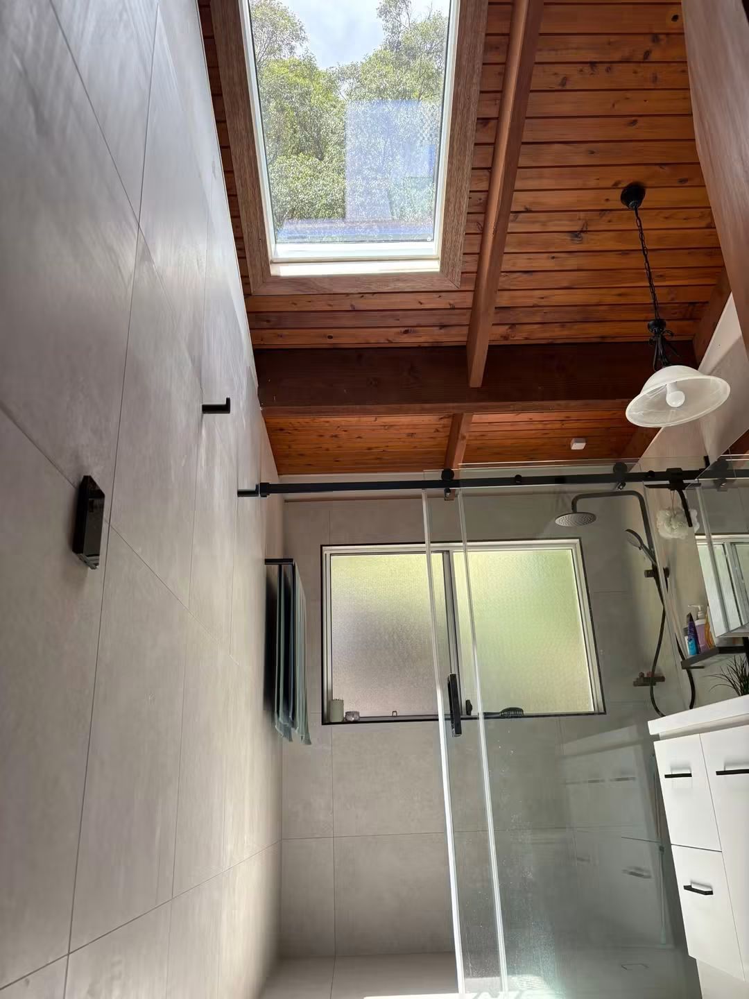 Skylight in a bathroom with a timber ceiling