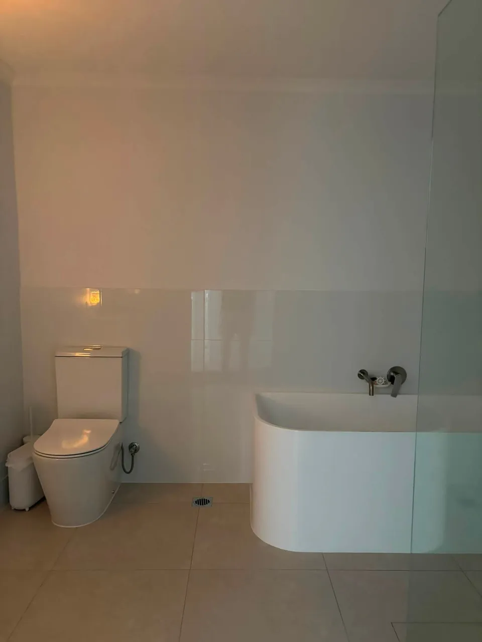 Bright newly renovated bathroom with a freestanding bath