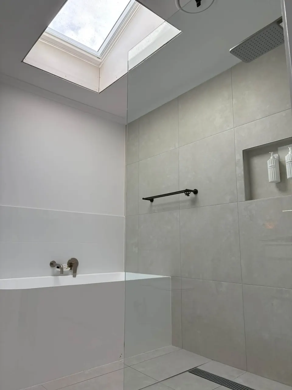Skylight above a tiled walk-in shower