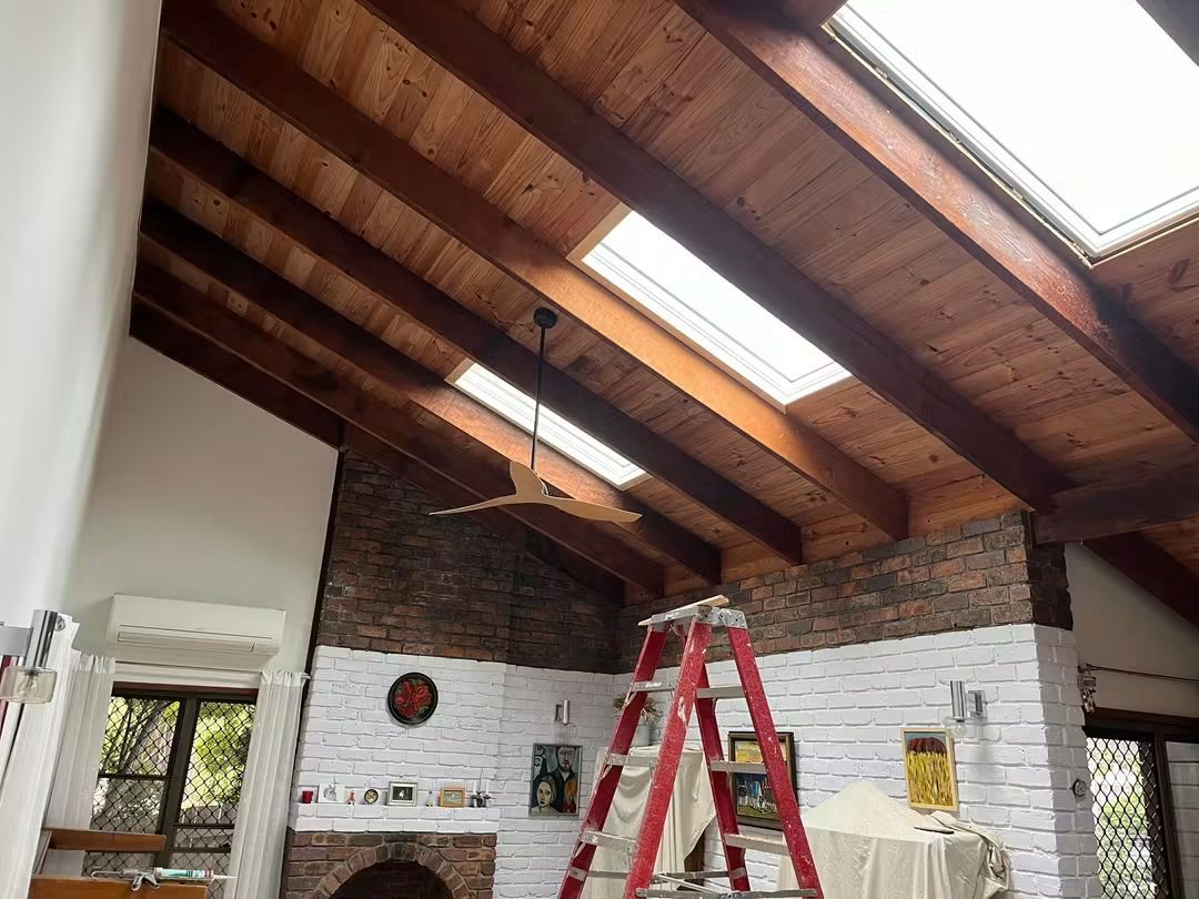 Skylights installed in a raked ceiling during a renovation
