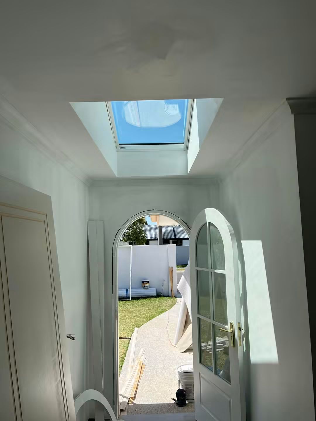 Skylight lighting an entry hallway
