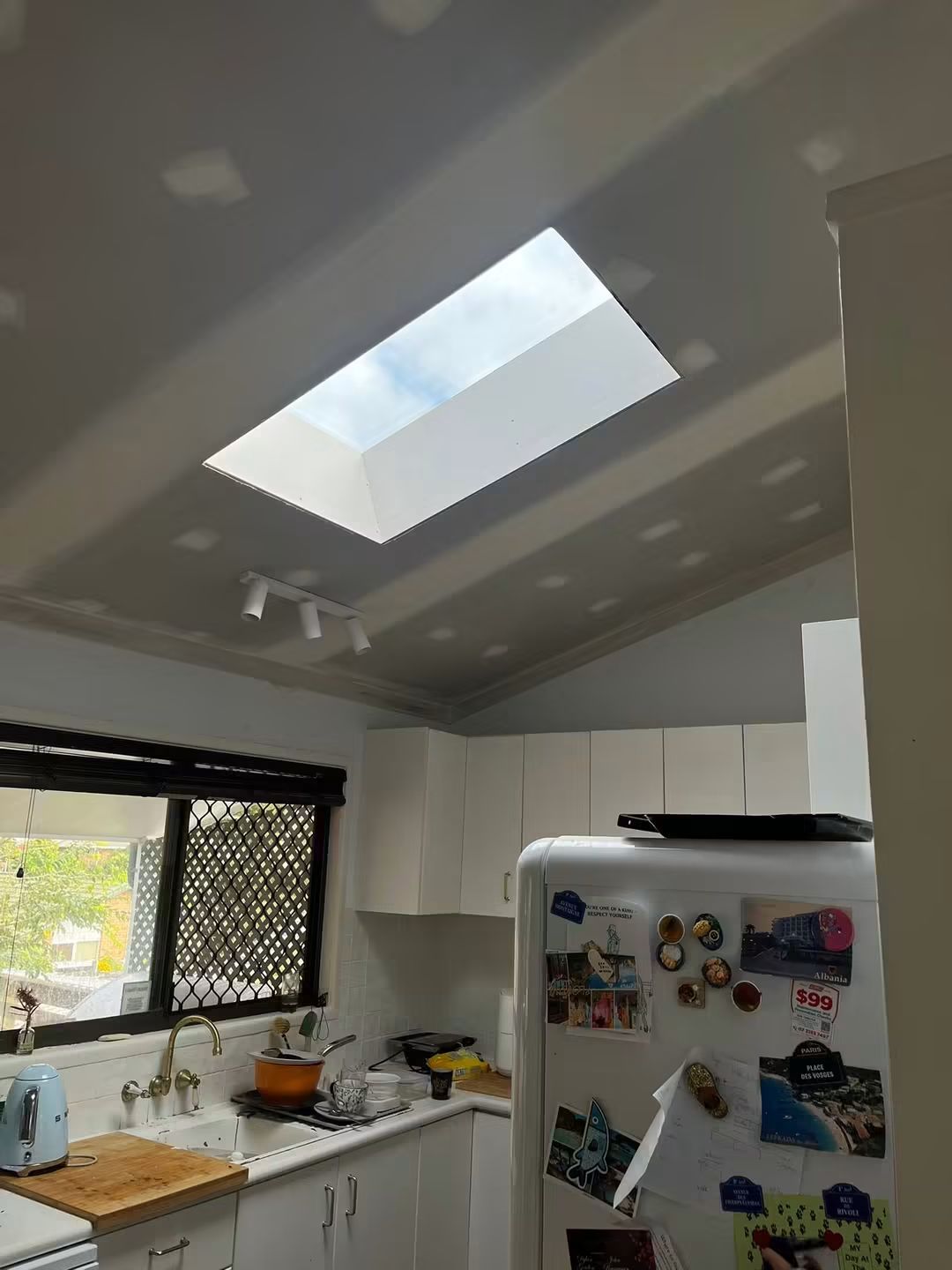 Skylight above a kitchen in a raked ceiling