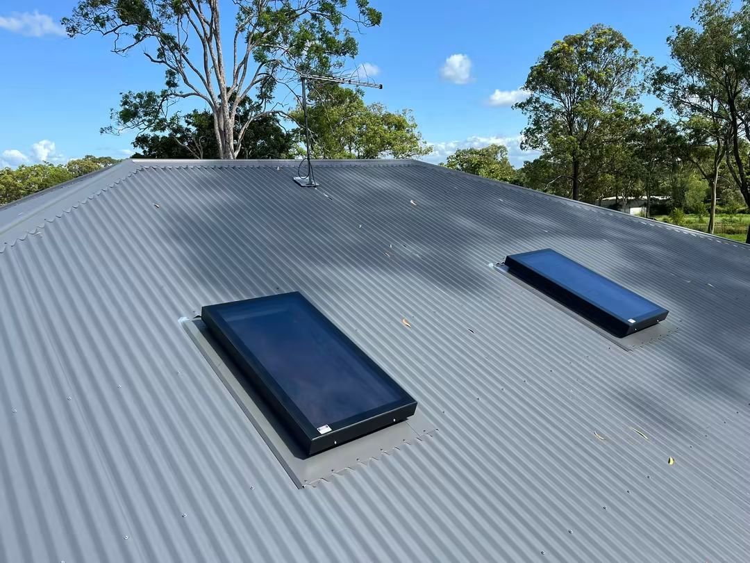Two skylights on a metal deck roof